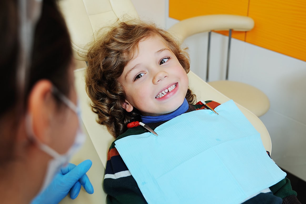 kid at dentist at Pediatric Dentistry on Kimball