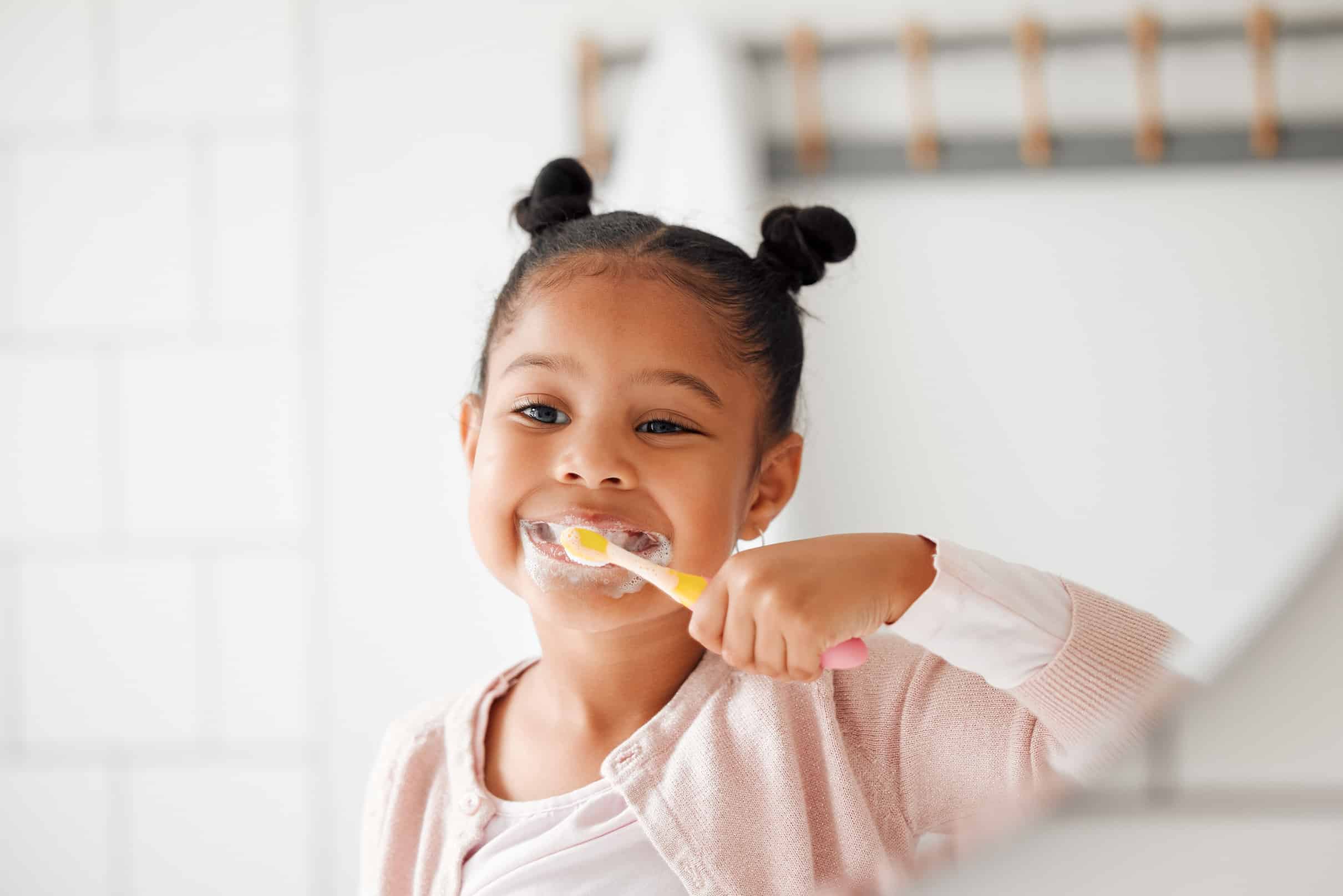 child brushing teeth at Pediatric Dentistry on Kimball