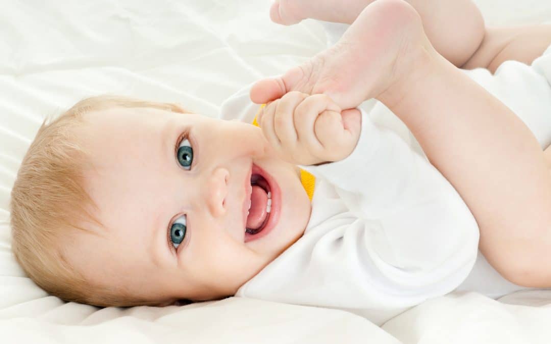 baby with healthy baby teeth after cavity treatment in Brooklyn NY