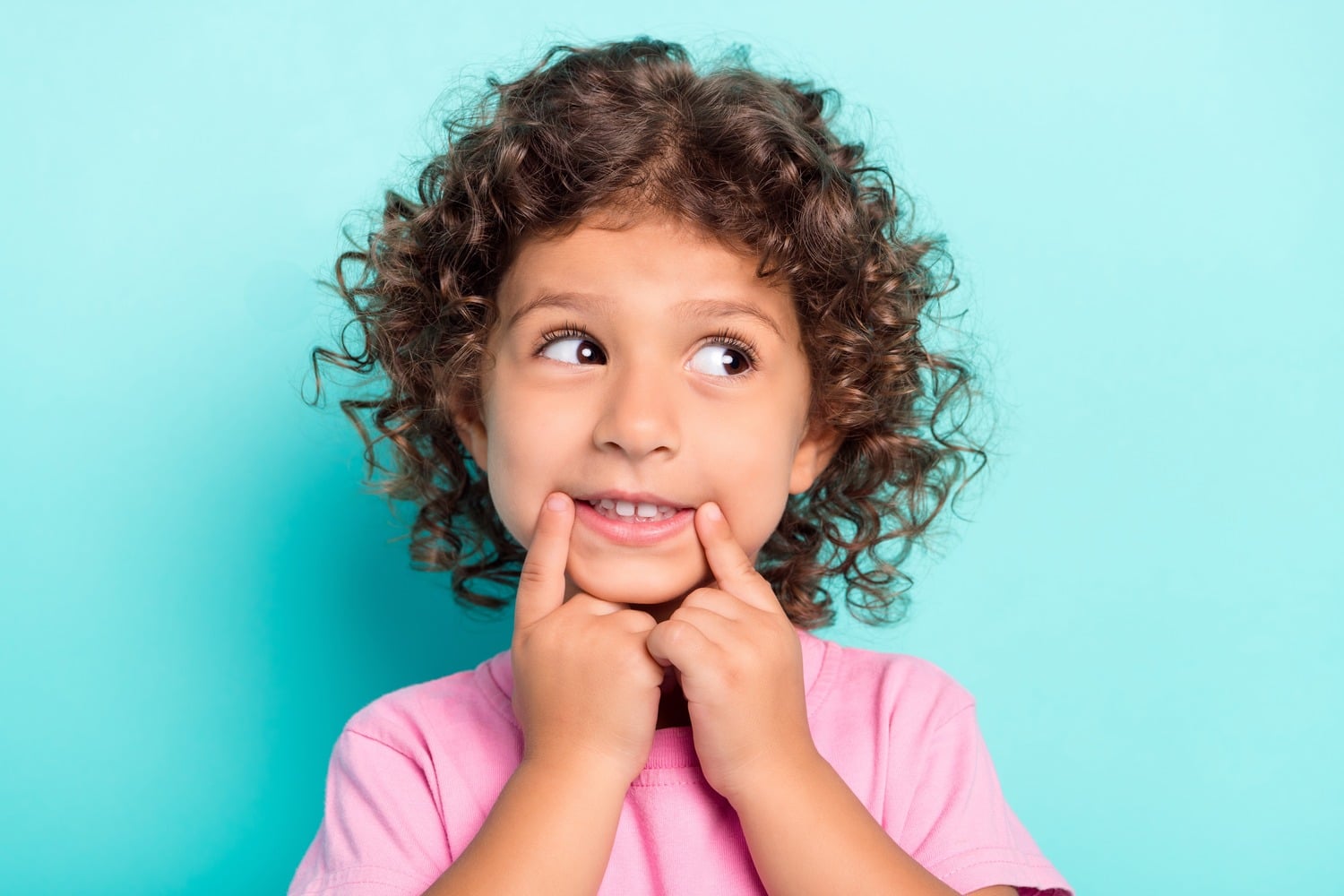 Girl shows off her smile before pediatric general anethesia at Pediatric Dentistry on Kimball in Brooklyn